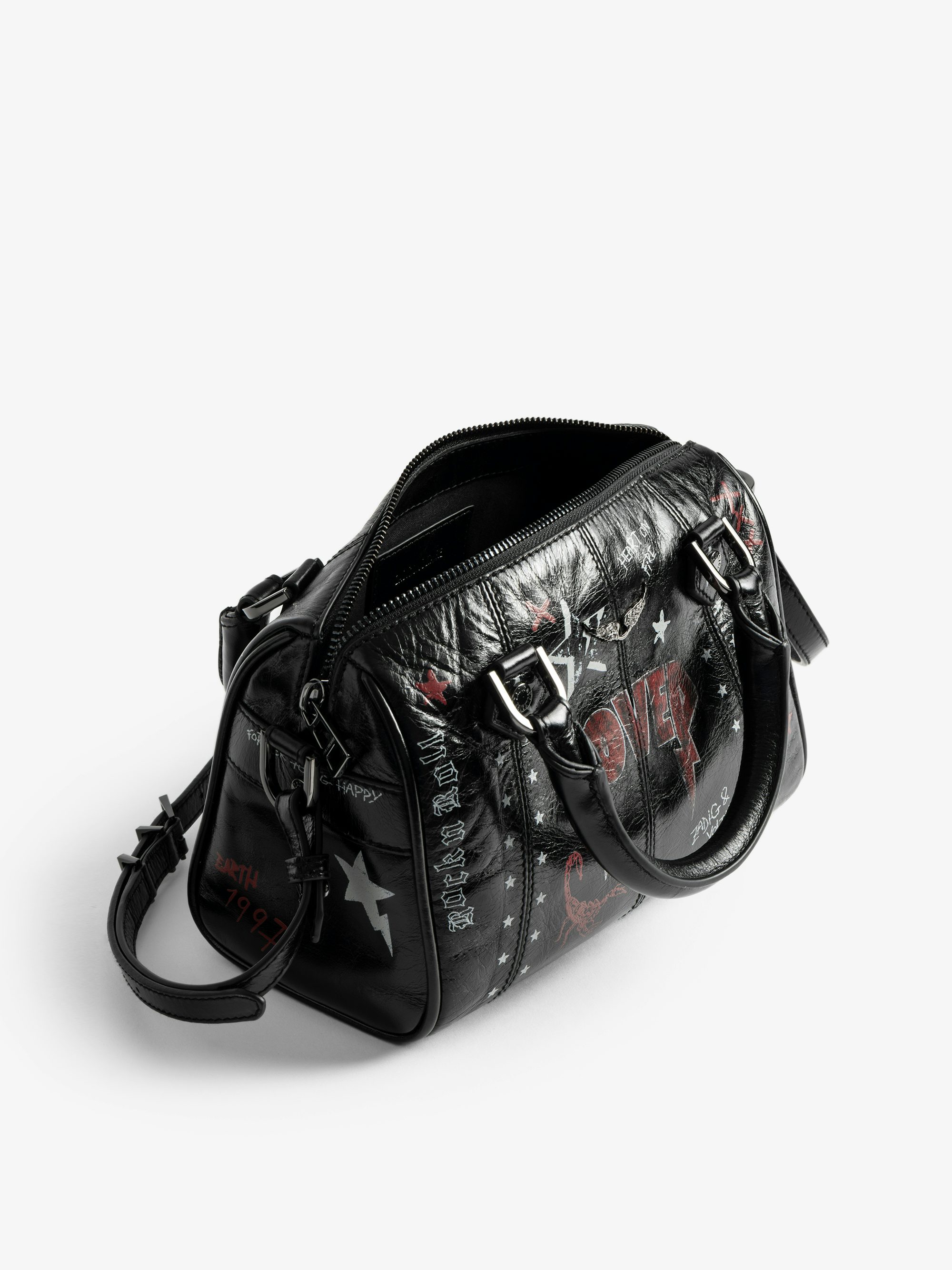 Sunny XS Punk Bag - Mini bag in patent leather with vintage effect, punk tag, adjustable shoulder strap and wings signature.